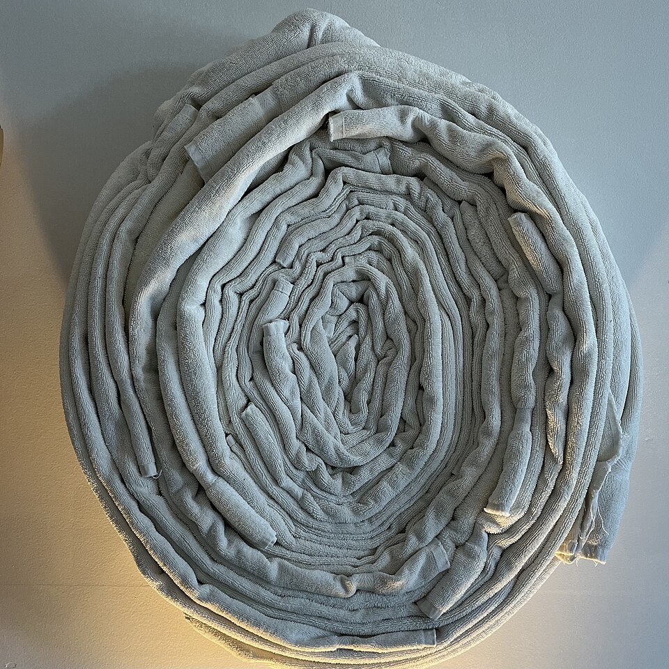 Towel art multiple towels of same color single towel roll