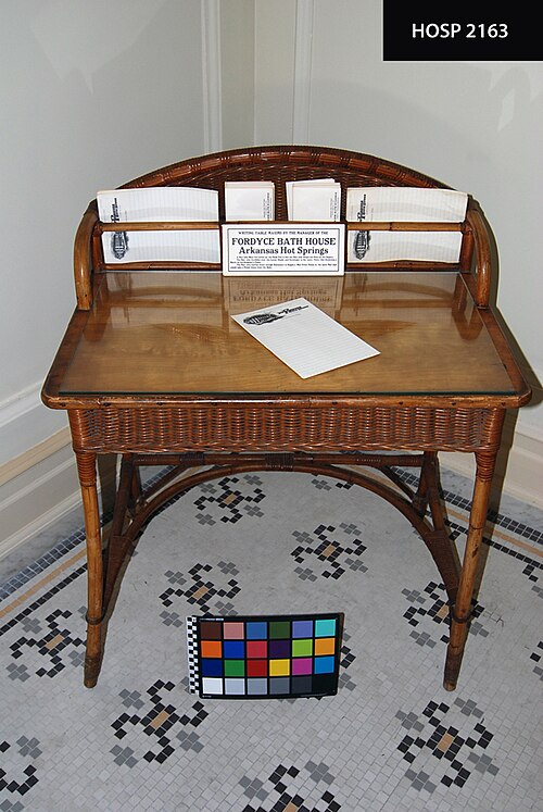 File-Wicker & rattan desk with glass top-Natural, varnished; rounded wicker back extends above desk with rattan dividers in front (734246ed-6c16-4a93-bfa8-0bb7983c8a32)