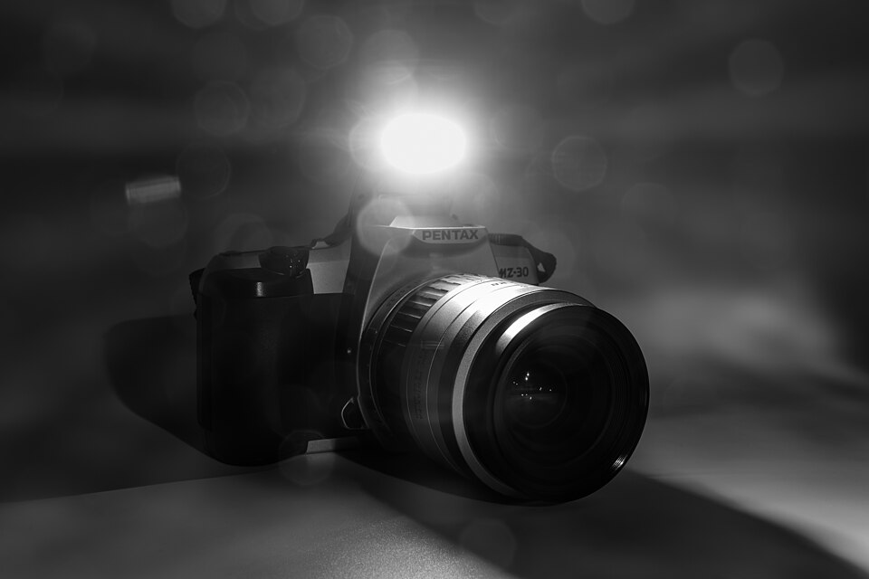 The built in flash of a SLR camera, Pentax MZ-30, firing 1