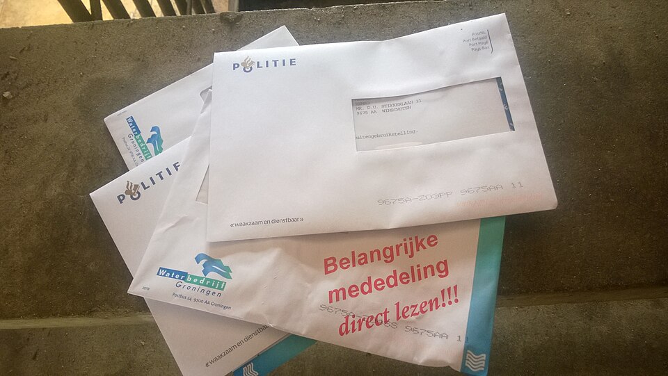 Unopened police and water bill envelopes, Winschoten (2014)