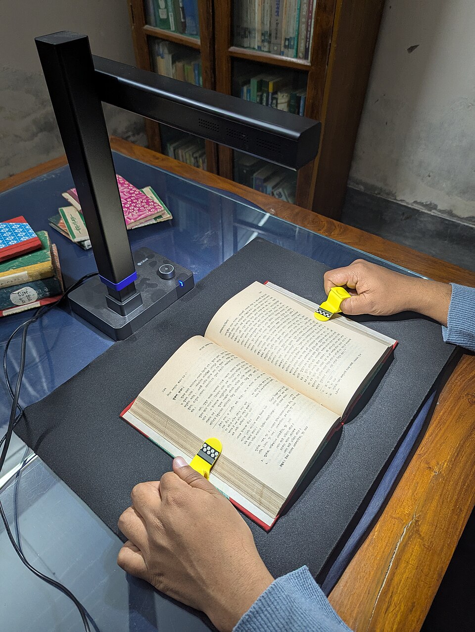 Book scanning at Shah Makhdum Institute Public Library