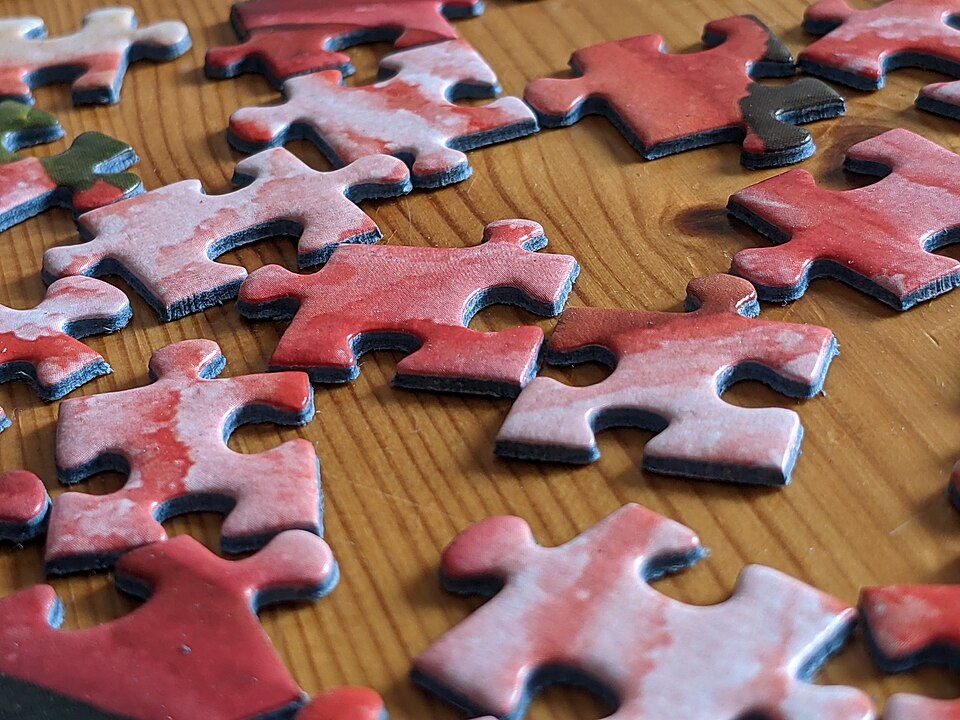 Red jigsaw puzzle pieces 2