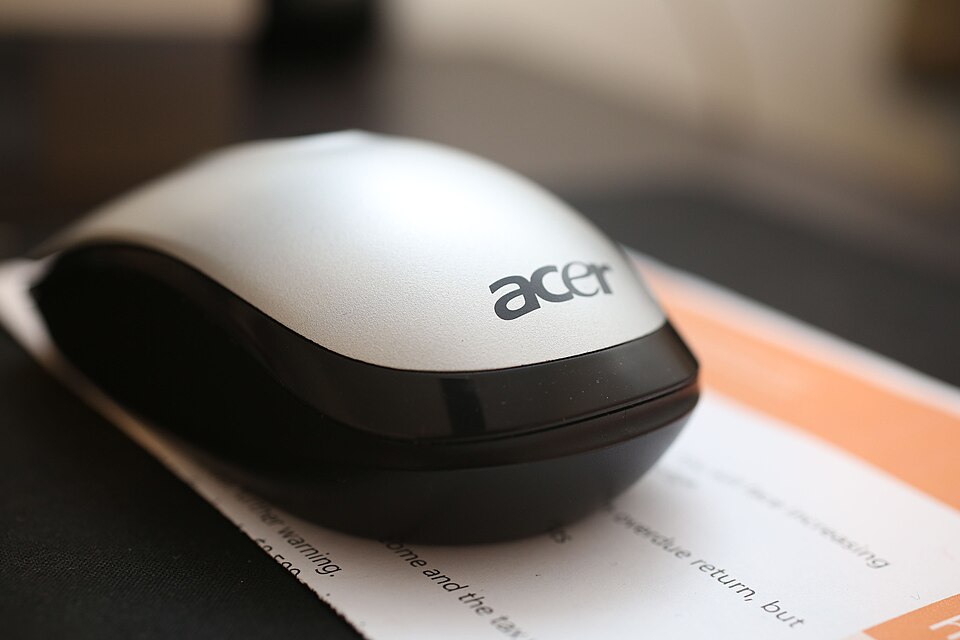 Acer computer mouse on paper