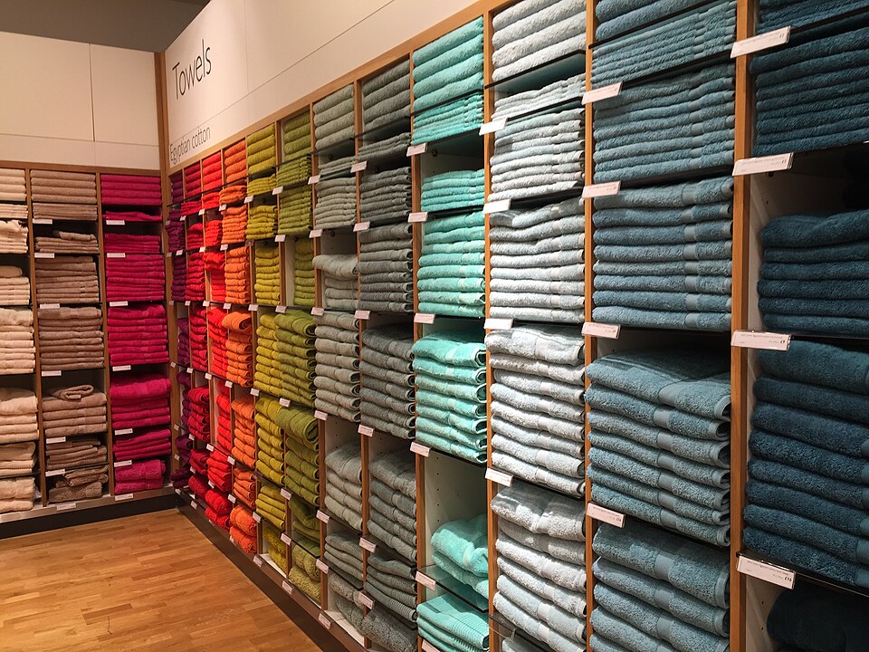 Multicoloured bath towels, John Lewis, Reading, UK - 20150711-01