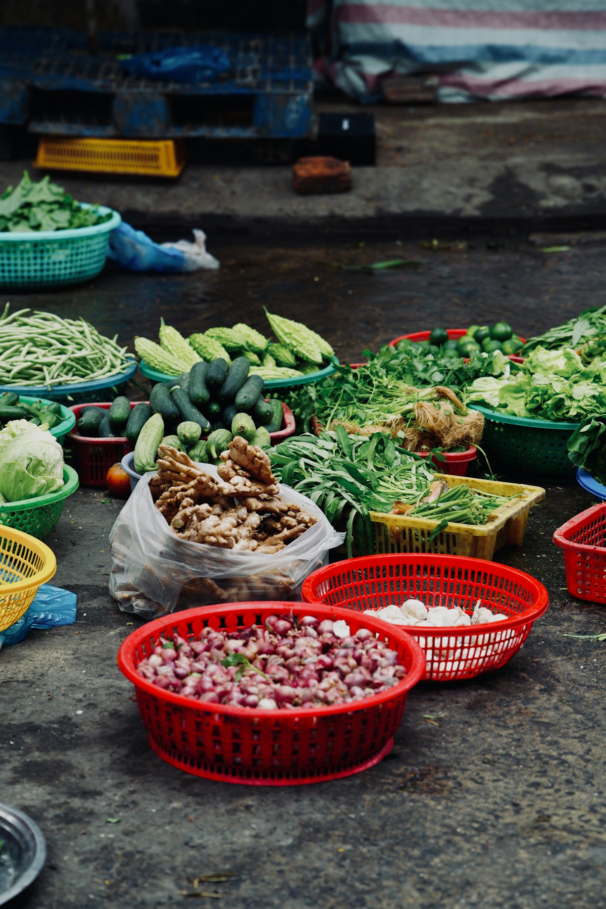 Fresh vegetables and leafy greens displayed at a market